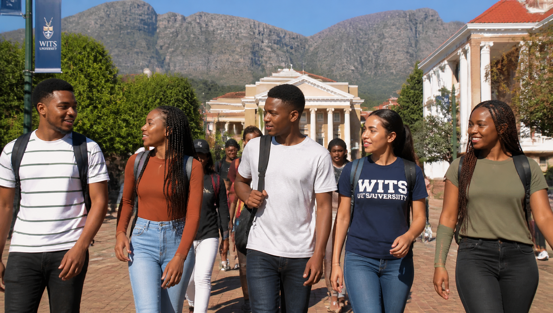 South African university students walking across campus